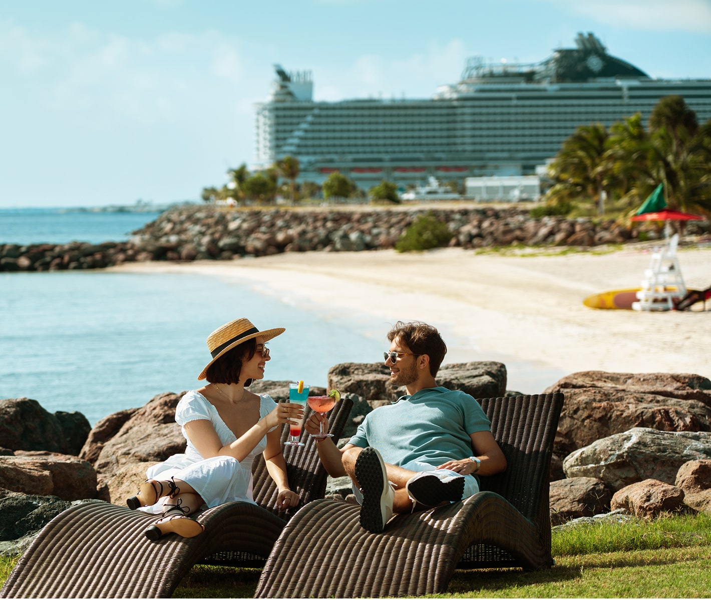 Couple lounging on MSC Cruises Private Island Ocean Cay | MSC Cruises