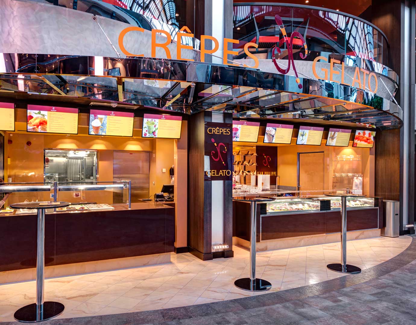 Crepes and gelato stand onboard with colorful menus and dessert displays | MSC Cruises